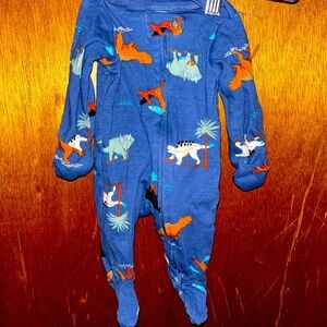 Blue Carter’s dinosaur onesie